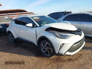 2021 Toyota C-HR LE with VIN JTNKHMBX3M1114590, listed as a IAAI auction lot 41560459 with 61,803 mi miles. Bid and sale history available at carsss.com. Image 1.