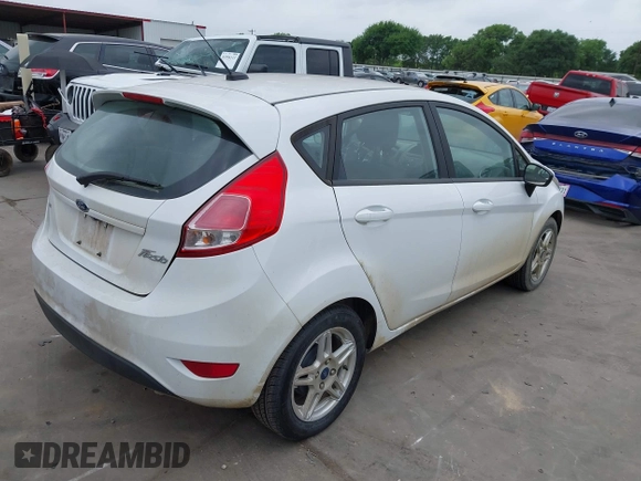2019 Ford Fiesta SE with VIN 3FADP4EJ2KM157184, listed as a IAAI auction lot 41970286 with 68,900 mi miles. Bid and sale history available at carsss.com. Image 4.