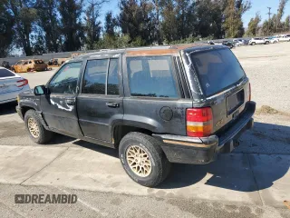 1993 Jeep Grand Cherokee Limited with VIN 1J4GZ78S3PC502345, listed as a Copart auction lot 46933805 with 121,652 mi miles and Salvage title. Bid and sale history available at DreamBid. Image 2.