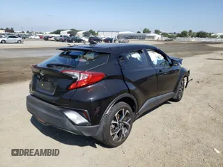 2018 Toyota C-HR XLE z VIN NMTKHMBX6JR062387, wystawiony jako Copart lot #56206091 z przebiegiem 47 001 mil mil oraz Szkoda całkowita • Salvage title. Historia ofert i sprzedaży dostępna na DreamBid. Obrazek 4.