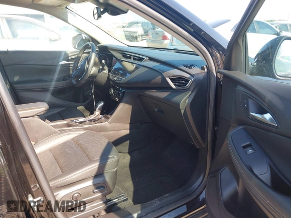 2023 Buick Encore GX Essence with VIN KL4MMFSL4PB075096, listed as a IAAI auction lot 42557102 with 28,826 mi miles and . Bid and sale history available at DreamBid. Image 5.