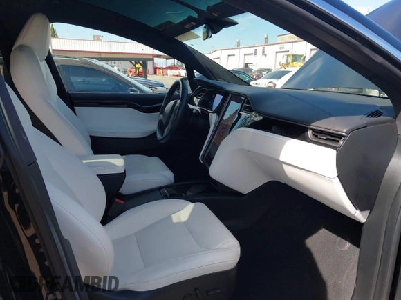 2020 Tesla Model X Long Range with VIN 5YJXCDE20LF265157, listed as a IAAI auction lot 41809572 with 58,599 mi miles. Bid and sale history available at carsss.com. Image 5.