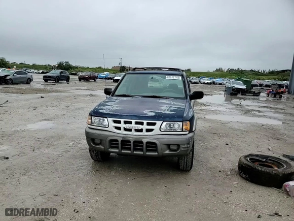 2002 Isuzu Rodeo S with VIN 4S2CK58W624340508, listed as a Copart auction lot 87872745 with 144,432 mi miles and Salvage Title. Bid and sale history available at carsss.com. Image 11.
