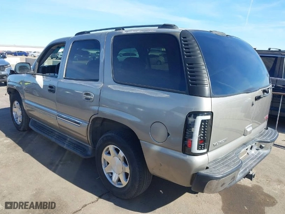 2003 GMC Yukon SLT with VIN 1GKEK13Z83J333386, listed as a IAAI auction lot 41425453 with 118,889 mi miles. Bid and sale history available at carsss.com. Image 3.