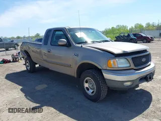 2002 Ford F-150 XL z VIN 2FTRX18W32CA77183, wystawiony jako IAAI lot #42220490 z przebiegiem 145 906 mil mil oraz . Historia ofert i sprzedaży dostępna na DreamBid. Obrazek 1.