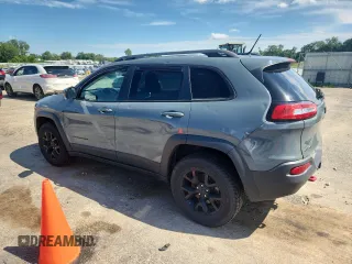 2015 Jeep Cherokee Trailhawk with VIN 1C4PJMBS4FW687328, listed as a Copart auction lot 58927765 with 119,483 mi miles and Non repairable. Bid and sale history available at DreamBid. Image 2.