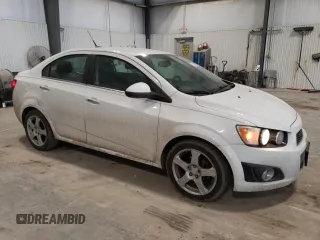 2014 Chevrolet Sonic LTZ with VIN 1G1JE5SB8E4217967, listed as a Copart auction lot 47609215 with 152,322 mi miles and Salvage Title. Bid and sale history available at carsss.com. Image 4.