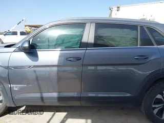 2024 Volkswagen Atlas SE z VIN 1V2DE2CA8RC202274, wystawiony jako IAAI lot #41864958 z przebiegiem 32 957 mil mil oraz . Historia ofert i sprzedaży dostępna na DreamBid. Obrazek 14.