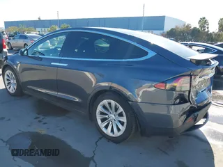 2016 Tesla Model X 70D with VIN 5YJXCBE24GF019450, listed as a IAAI auction lot 41517321 with 96,831 mi miles. Bid and sale history available at carsss.com. Image 3.