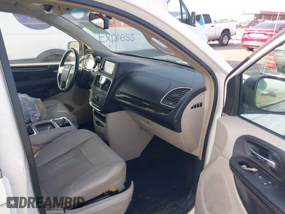 2012 Chrysler Town & Country Touring z VIN 2C4RC1BGXCR410507, wystawiony jako IAAI lot #41215704 z przebiegiem 161 501 mil mil oraz . Historia ofert i sprzedaży dostępna na DreamBid. Obrazek 5.