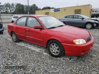 2003 Kia Spectra with VIN KNAFB121535245946, listed as a Copart auction lot 45688365 with 196,338 mi miles and Salvage Title. Bid and sale history available at DreamBid. Image 4.