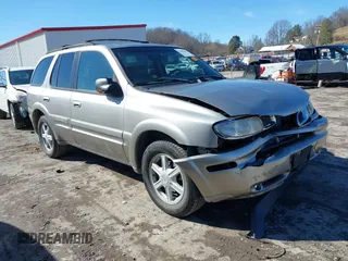 2002 Oldsmobile Bravada z VIN 1GHDT13S522105386, wystawiony jako IAAI lot #41698681 z przebiegiem 146 925 mil mil oraz . Historia ofert i sprzedaży dostępna na DreamBid. Obrazek 1.