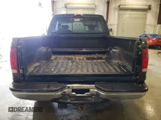 2001 Ford Super Duty F-250 XL with VIN 1FTNX21L91EC26077, listed as a Copart auction lot 71952324 with 221,340 mi miles and Salvage Title. Bid and sale history available at carsss.com. Image 6.