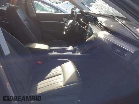 2021 Audi e-tron Premium Plus with VIN WA1LAAGE1MB015242, listed as a IAAI auction lot 41596316 with 32,768 mi miles and . Bid and sale history available at DreamBid. Image 5.
