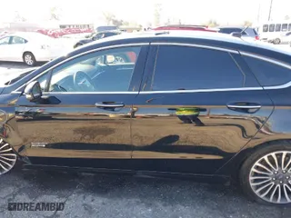 2017 Ford Fusion Energi Titanium with VIN 3FA6P0SU1HR116976, listed as a IAAI auction lot 39028290 with 86,678 mi miles. Bid and sale history available at carsss.com. Image 14.