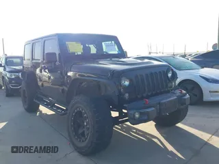 2015 Jeep Wrangler Unlimited Rubicon Hard Rock with VIN 1C4HJWFG7FL602344, listed as a IAAI auction lot 42011914 with 109,238 mi miles and . Bid and sale history available at DreamBid. Image 1.
