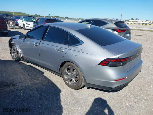 2023 Honda Accord Hybrid EX-L with VIN 1HGCY2F62PA050983, listed as a IAAI auction lot 40926361 with 63,930 mi miles. Bid and sale history available at carsss.com. Image 3.