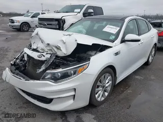 2016 Kia Optima EX with VIN 5XXGU4L30GG120518, listed as a IAAI auction lot 41602190 with 116,268 mi miles. Bid and sale history available at carsss.com. Image 2.