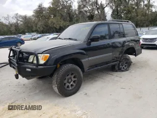2004 Lexus LX 470 with VIN JTJHT00WX43536762, listed as a Copart auction lot 47523605 with 141,130 mi miles and Salvage Title. Bid and sale history available at DreamBid. Image 1.