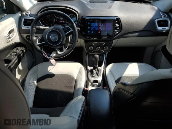 2017 Jeep Compass Latitude with VIN 3C4NJCBB1HT658590, listed as a Copart auction lot 60962925 with 140,352 mi miles and Salvage title. Bid and sale history available at DreamBid. Image 8.