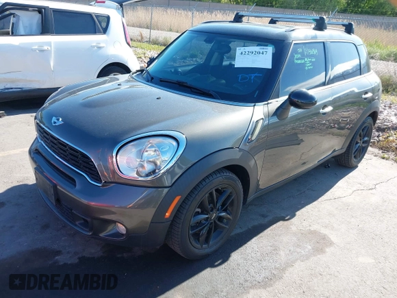 2014 MINI Countryman S z VIN WMWZC3C59EWP29686, wystawiony jako IAAI lot #42292047 z przebiegiem 93 139 mil mil oraz . Historia ofert i sprzedaży dostępna na DreamBid. Obrazek 2.