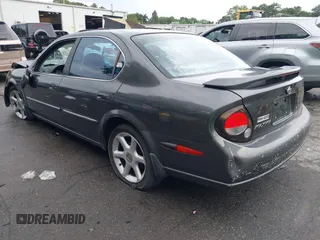 2000 Nissan Maxima GXE with VIN JN1CA31A3YT025913, listed as a IAAI auction lot 42635681 with 203,529 mi miles and . Bid and sale history available at DreamBid. Image 3.