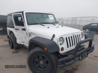 2013 Jeep Wrangler Sport with VIN 1C4AJWAG9DL653348, listed as a IAAI auction lot 42096860 with 55,575 mi miles and . Bid and sale history available at DreamBid. Image 1.