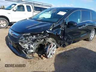 2019 Honda Odyssey EX with VIN 5FNRL6H54KB036540, listed as a IAAI auction lot 42124939 with 135,417 mi miles. Bid and sale history available at carsss.com. Image 6.