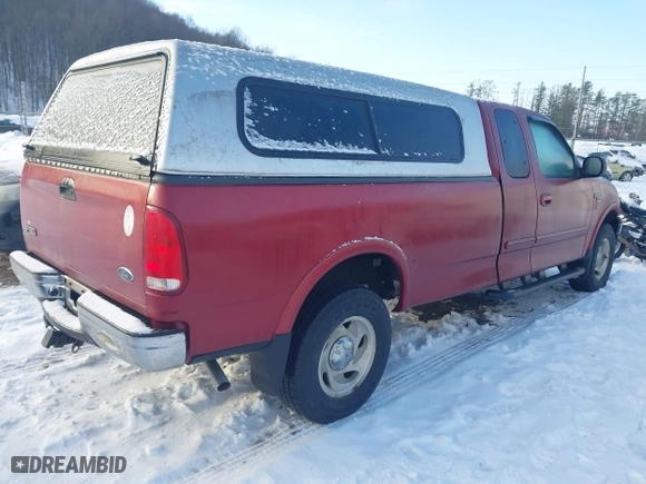 2000 Ford F-150 XL with VIN 1FTRX18WXYNC06121, listed as a IAAI auction lot 41340585 with 74,957 mi miles. Bid and sale history available at carsss.com. Image 4.