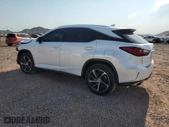 2016 Lexus RX 350 with VIN 2T2BZMCA5GC033906, listed as a Copart auction lot 64869445 with 129,861 mi miles and Salvage title. Bid and sale history available at DreamBid. Image 2.