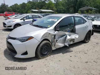 2019 Toyota Corolla L z VIN 2T1BURHE4KC241571, wystawiony jako Copart lot #56513965 z przebiegiem Nie podano mil oraz Szkoda całkowita • Salvage title. Historia ofert i sprzedaży dostępna na DreamBid. Obrazek 1.