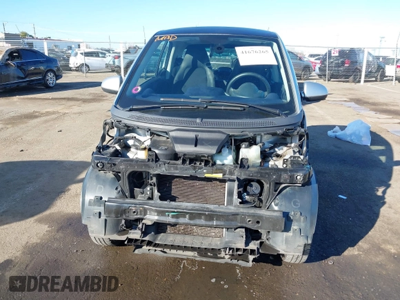2015 Smart fortwo Passion z VIN WMEEJ3BA7FK805194, wystawiony jako IAAI lot #41676265 z przebiegiem 47 096 mil mil oraz . Historia ofert i sprzedaży dostępna na DreamBid. Obrazek 6.