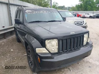 2011 Jeep Liberty Sport with VIN 1J4PP2GK0BW559054, listed as a IAAI auction lot 41642092 with 273,927 mi miles. Bid and sale history available at carsss.com. Image 1.