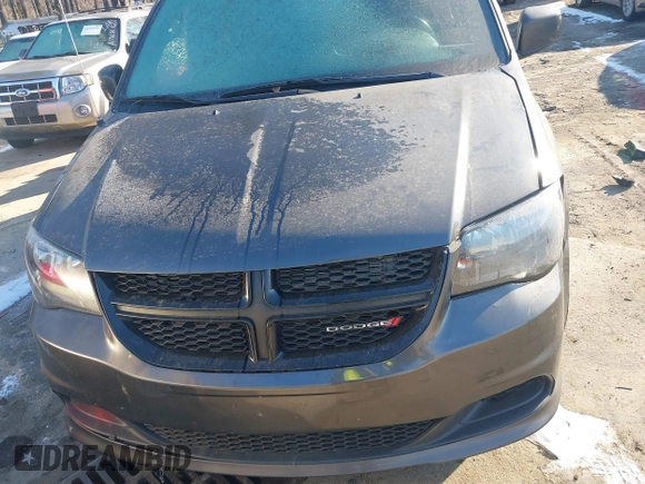 2016 Dodge Grand Caravan SE with VIN 2C4RDGBG1GR357895, listed as a IAAI auction lot 41389733 with 131,175 mi miles and . Bid and sale history available at DreamBid. Image 6.