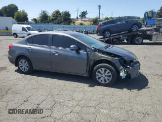 2012 Honda Civic LX z VIN 2HGFB2F59CH603985, wystawiony jako Copart lot #55675435 z przebiegiem 125 567 mil mil oraz Szkoda całkowita • Salvage title. Historia ofert i sprzedaży dostępna na DreamBid. Obrazek 4.
