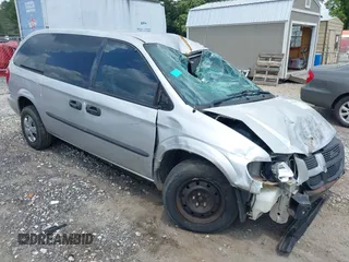 2004 Dodge Caravan SE with VIN 1D4GP24R34B516803, listed as a IAAI auction lot 40130969 with 192,511 mi miles. Bid and sale history available at carsss.com. Image 1.