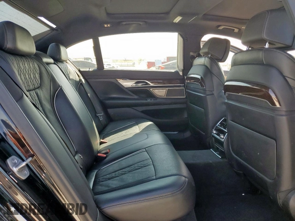 2022 BMW 7 Series 740i with VIN WBA7T2C01NCK41405, listed as a Copart auction lot 50586975 with 45,454 mi miles and Salvage Title. Bid and sale history available at carsss.com. Image 10.