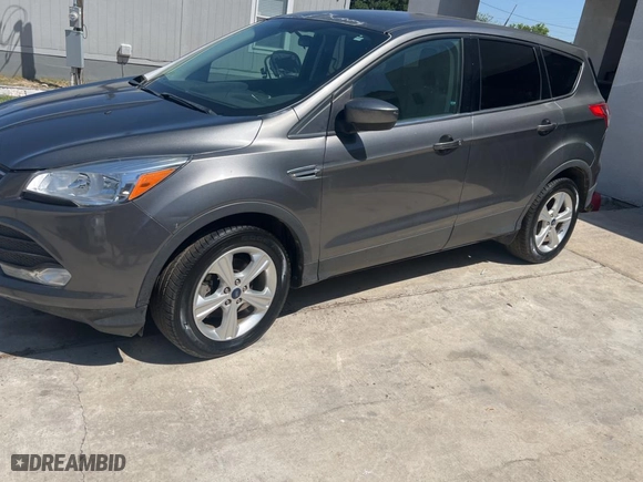 2014 Ford Escape SE with VIN 1FMCU0GX0EUC29973, listed as a Copart auction lot 52974065 with 97,009 mi miles and Clean Title. Bid and sale history available at carsss.com. Image 2.