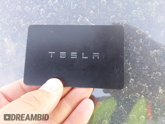 2022 Tesla Model Y Long Range z VIN 7SAYGDEE7NA006476, wystawiony jako IAAI lot #41894606 z przebiegiem 63 380 mil mil oraz . Historia ofert i sprzedaży dostępna na DreamBid. Obrazek 11.