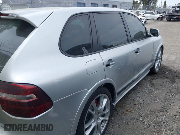 2009 Porsche Cayenne GTS with VIN WP1AD29P39LA60854, listed as a IAAI auction lot 42034711 with 116,015 mi miles and . Bid and sale history available at DreamBid. Image 4.