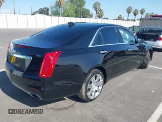 2016 Cadillac CTS Luxury Collection RWD z VIN 1G6AR5SS8G0156144, wystawiony jako IAAI lot #42087602 z przebiegiem Nie podano mil oraz . Historia ofert i sprzedaży dostępna na DreamBid. Obrazek 4.