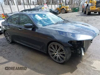 2018 BMW 5 Series 540i xDrive with VIN WBAJE7C51JWD52637, listed as a IAAI auction lot 41833289 with 61,867 mi miles and . Bid and sale history available at DreamBid. Image 1.