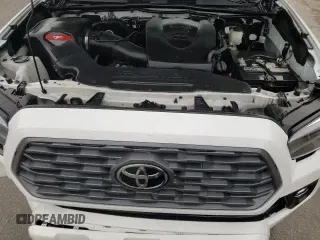 2021 Toyota Tacoma SR with VIN 3TMCZ5AN6MM426322, listed as a Copart auction lot 67056905 with 71,144 mi miles and Clean title. Bid and sale history available at DreamBid. Image 13.