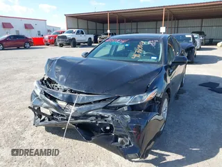2019 Toyota Camry LE z VIN 4T1B11HK8KU197444, wystawiony jako IAAI lot #41710904 z przebiegiem 137 766 mil mil oraz . Historia ofert i sprzedaży dostępna na DreamBid. Obrazek 17.