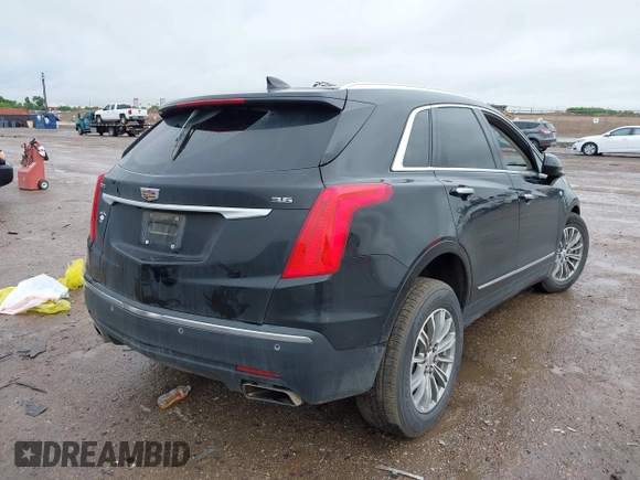 2017 Cadillac XT5 Luxury FWD with VIN 1GYKNBRS6HZ159892, listed as a IAAI auction lot 42159721 with 163,856 mi miles and . Bid and sale history available at DreamBid. Image 4.