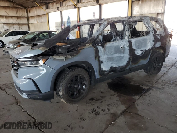 2023 Honda Pilot TrailSport with VIN 5FNYG1H68PB048581, listed as a Copart auction lot 70252094 with 0 mi miles and Salvage Title. Bid and sale history available at carsss.com. Image 1.