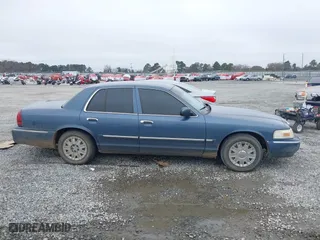 2007 Mercury Grand Marquis GS with VIN 2MEFM74V27X609128, listed as a IAAI auction lot 41474359 with 99,050 mi miles. Bid and sale history available at carsss.com. Image 13.