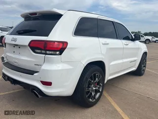 2015 Jeep Grand Cherokee SRT with VIN 1C4RJFDJ3FC896473, listed as a Copart auction lot 53915385 with 124,091 mi miles and Clean Title. Bid and sale history available at carsss.com. Image 4.