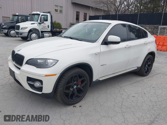 2012 BMW X6 50i z VIN 5UXFG8C53CL590479, wystawiony jako IAAI lot #42021810 z przebiegiem 92 420 mil mil oraz . Historia ofert i sprzedaży dostępna na DreamBid. Obrazek 18.