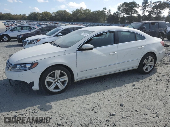 2013 Volkswagen CC Sport with VIN WVWBP7ANXDE565694, listed as a Copart auction lot 77947514 with 180,160 mi miles and Salvage Title. Bid and sale history available at carsss.com. Image 1.